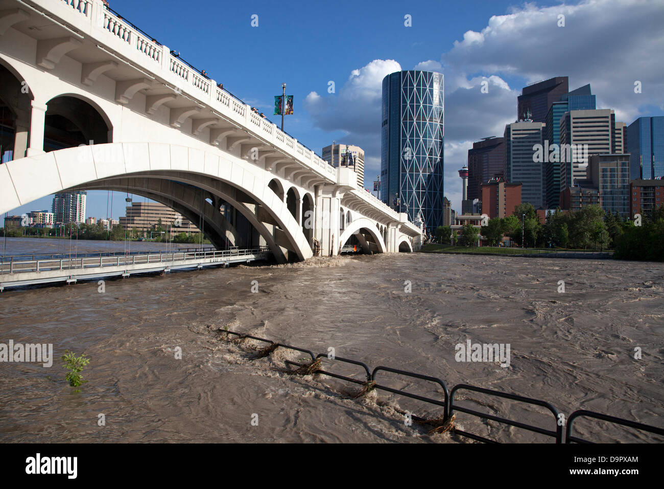 Saturday, June 22, 2013. The bike path at Centre Street Bridge underwater as floodwaters recede the day after peak flows in central Calgary, Alberta, Canada. Heavy rains caused severe flooding and led to declaration of a state of emergency, mandatory evacuation orders for the downtown core and many residential areas, power outages and property damage. Stock Photo