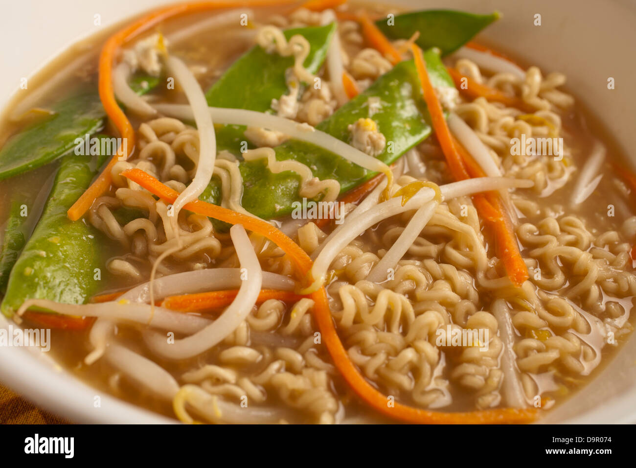 Bowl of instant ramen with added vegetables Stock Photo