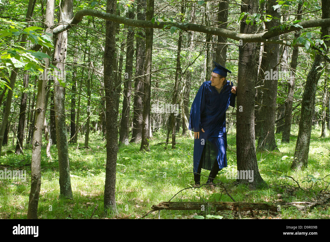 Perplexed graduate student in forest Stock Photo