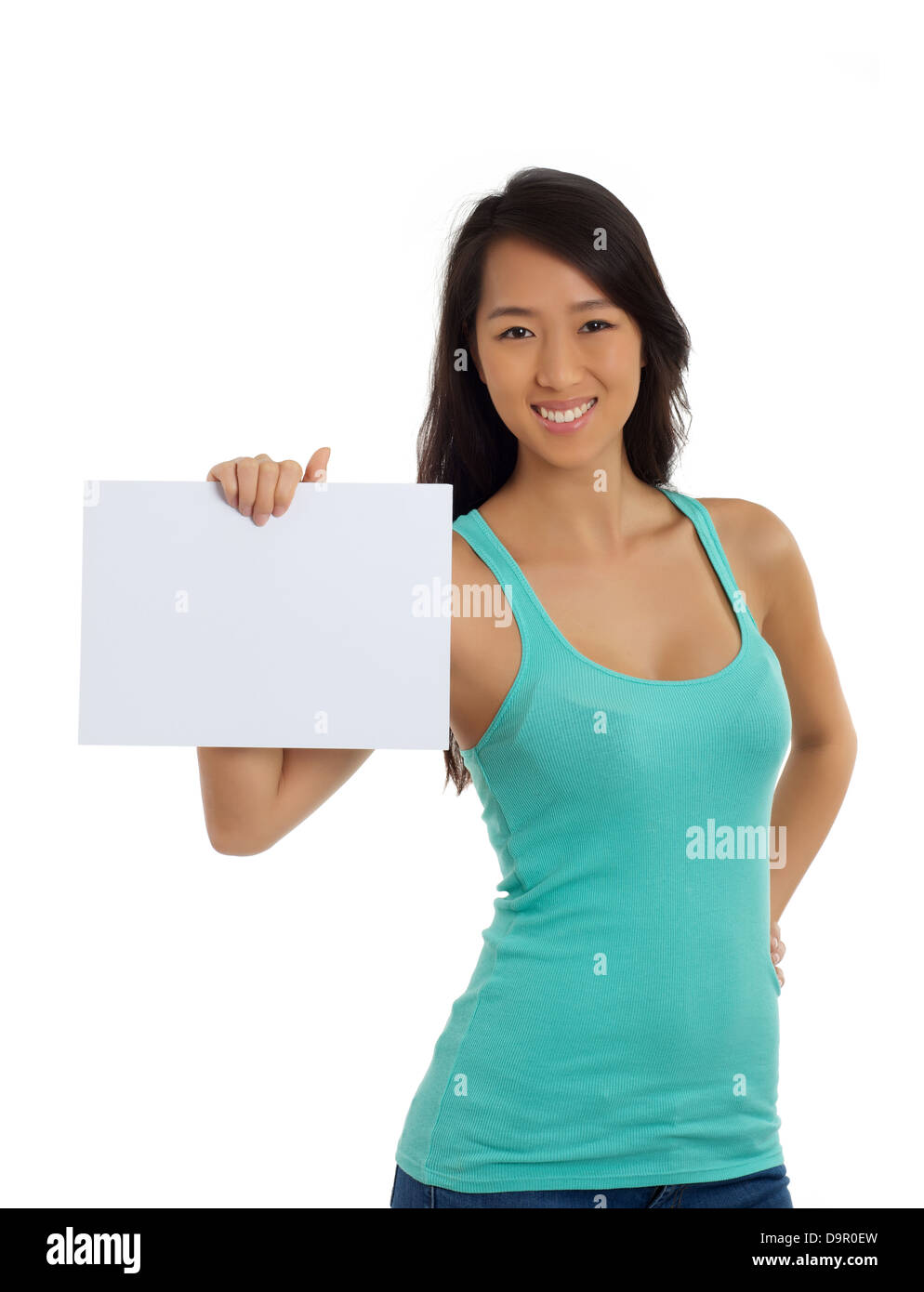Beautiful Asian woman holding blank piece of paper Stock Photo