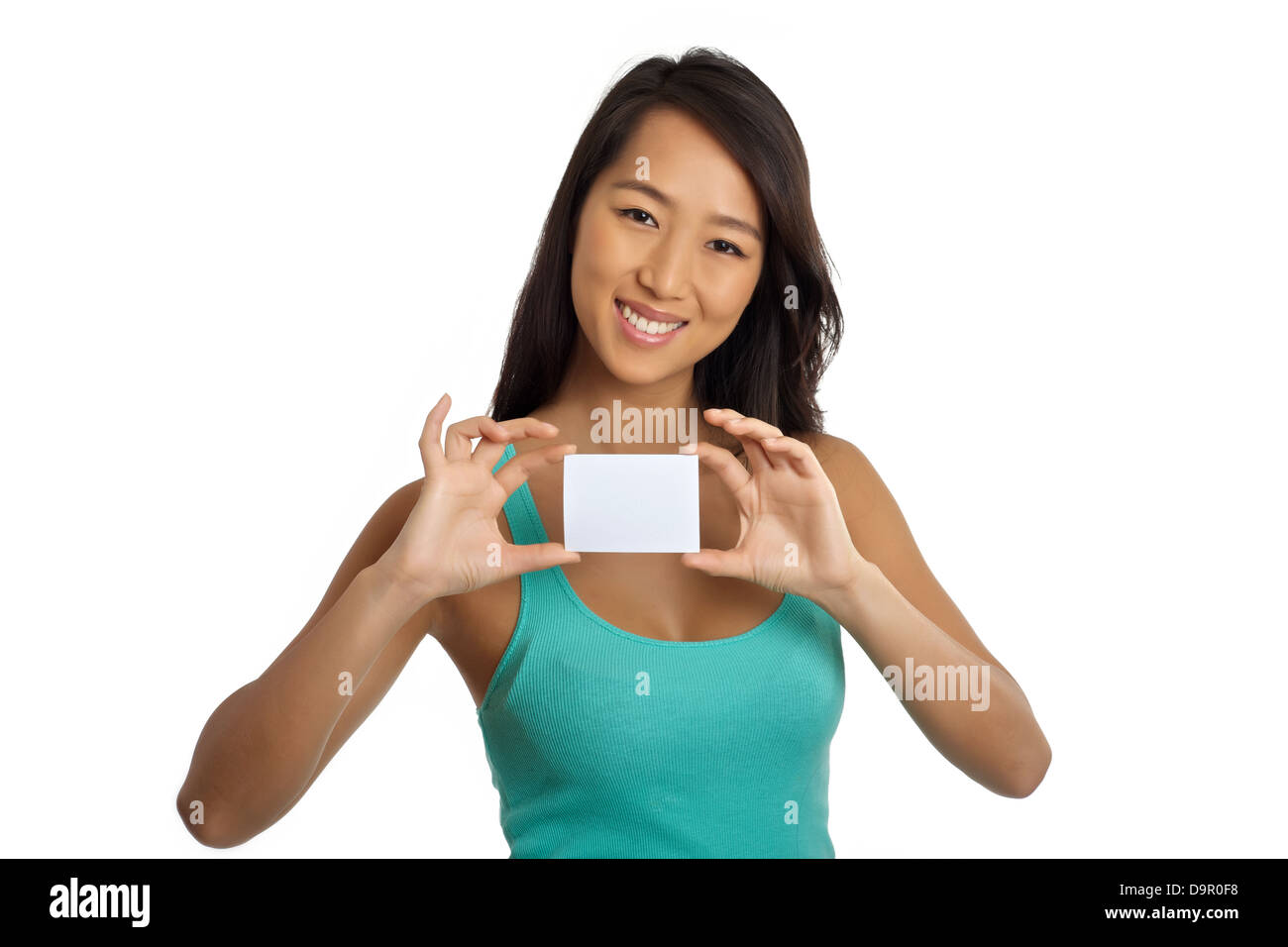 Beautiful Asian woman showing blank business card Stock Photo