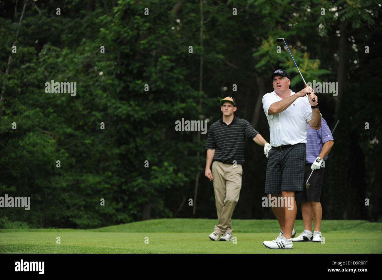 Huntington, N.Y, U.S. June 24, 2013.  Former NFL quarterback Neil O'Donnell hits from the tee box during the second annual Big Daddy Celebrity Golf Classic at Cold Spring Country Club in Huntington, N.Y. Credit:  Cal Sport Media/Alamy Live News Stock Photo