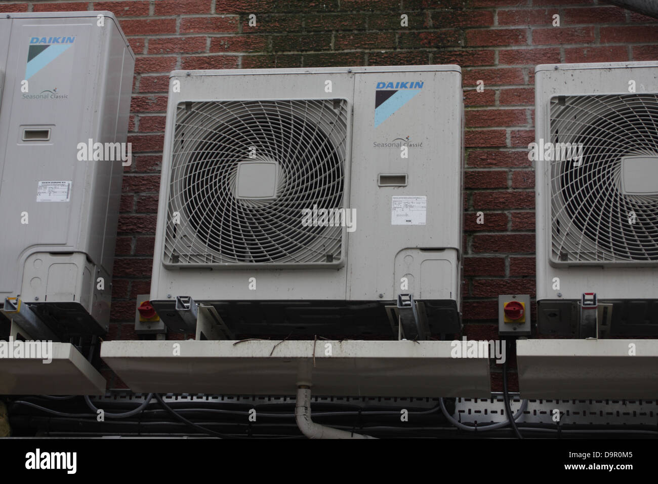 Air conditioning units mounted on wall Stock Photo Alamy