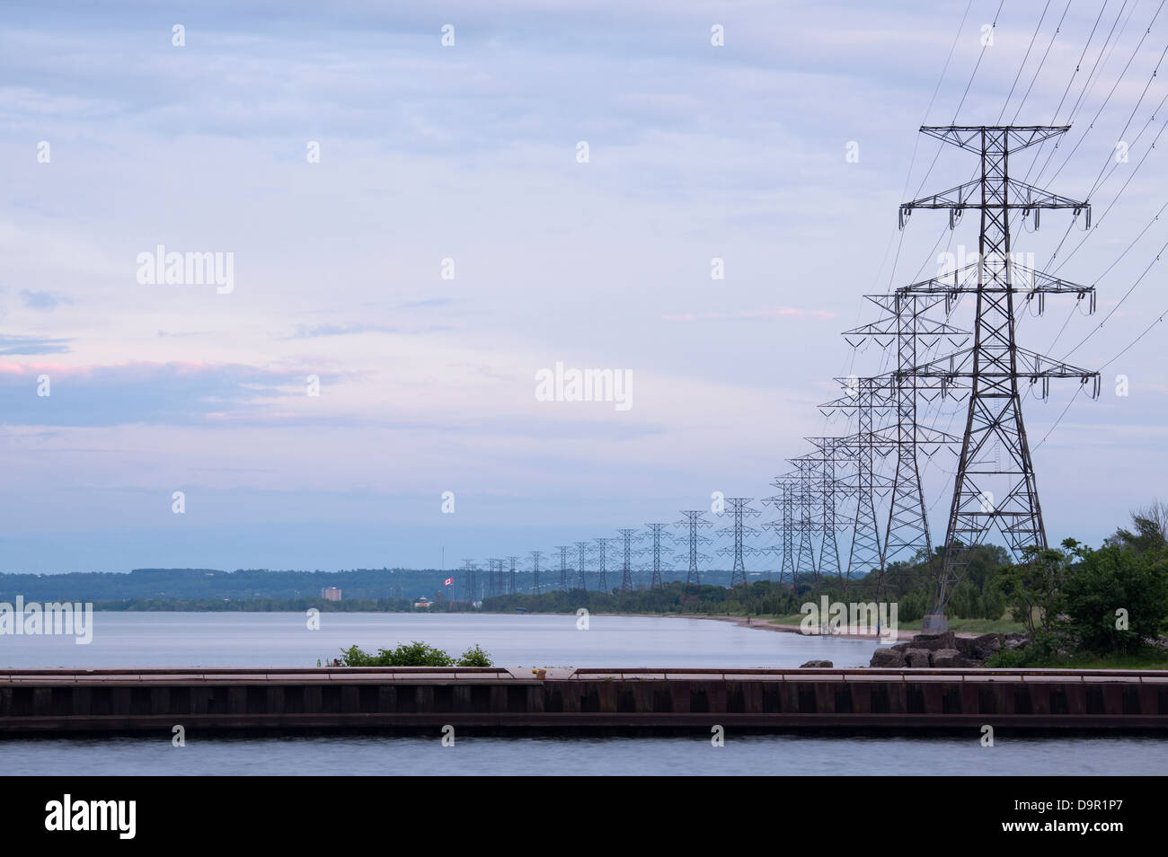 Pier and hydro lines along the waterfront, Hamilton, Ontario, Canada. Stock Photo