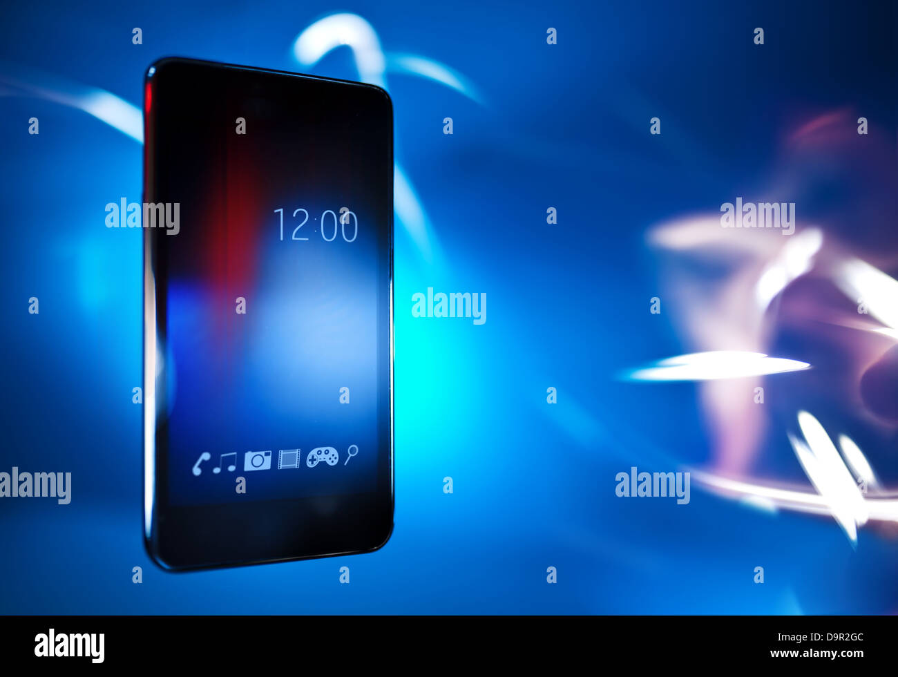 Black smart phone on blue defocus background, concept, template design Stock Photo