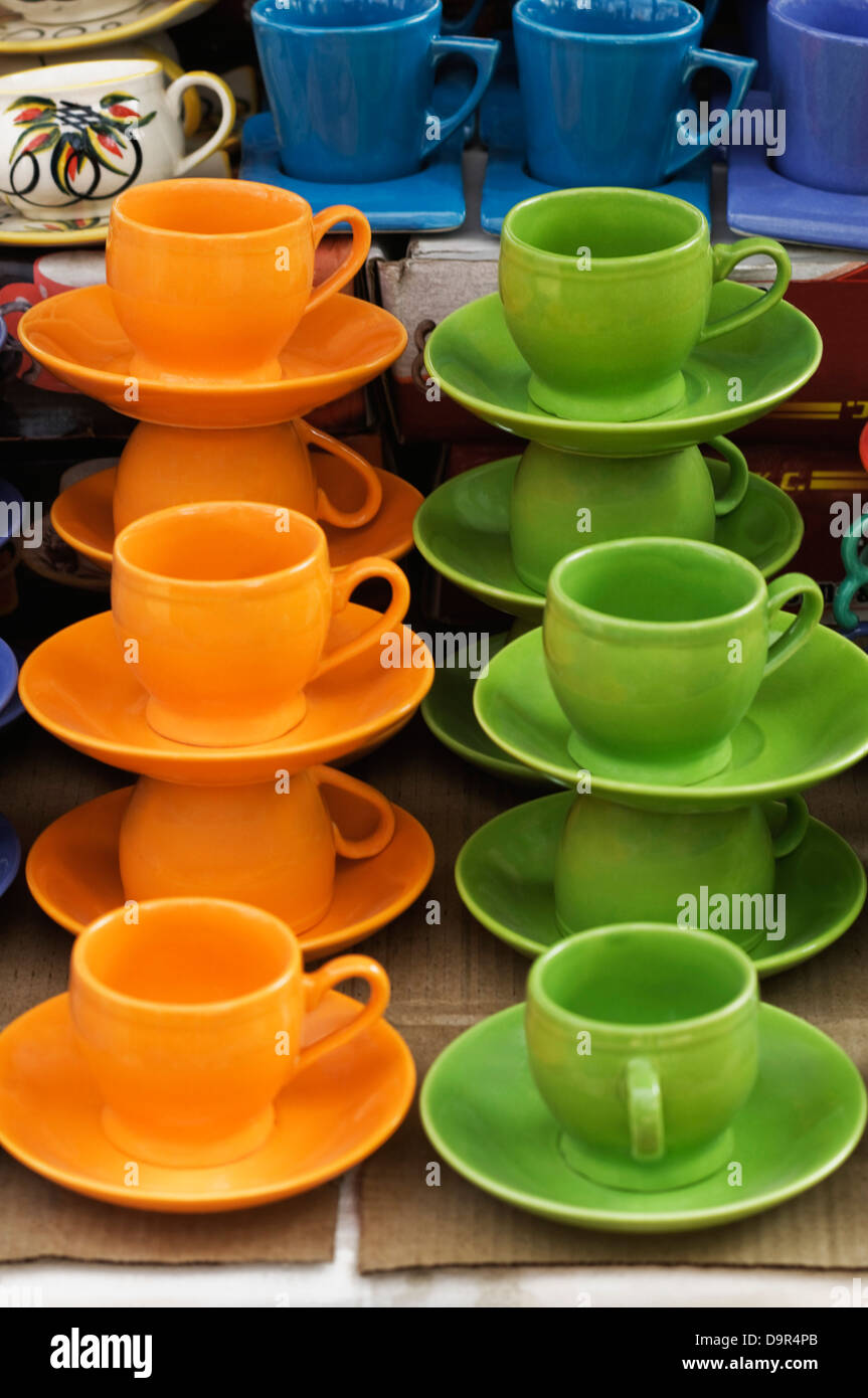 Display of tea cups with saucers for sale at market stall Stock Photo