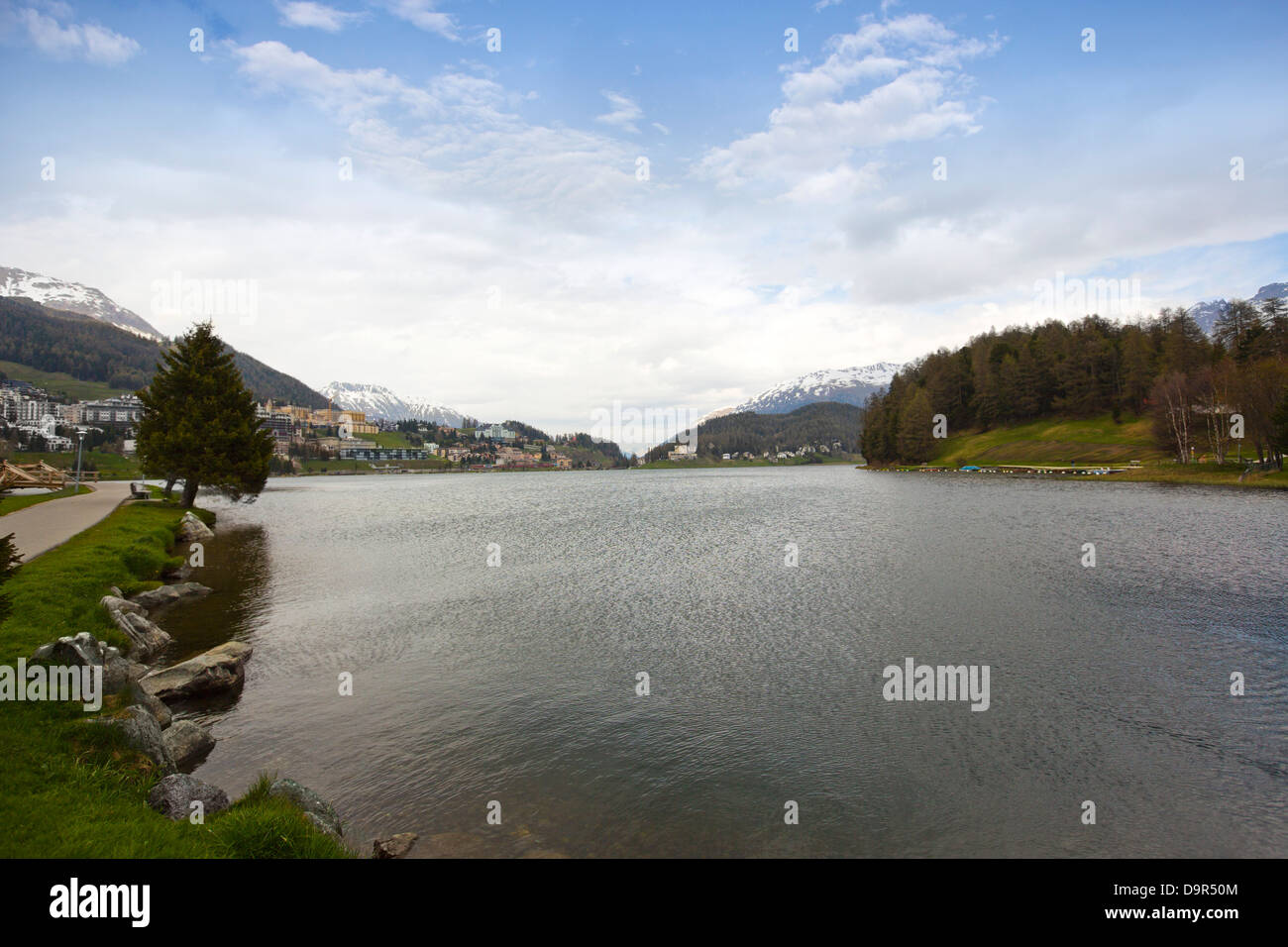 Lake with town in the background, St. Moritz, Italy Stock Photo