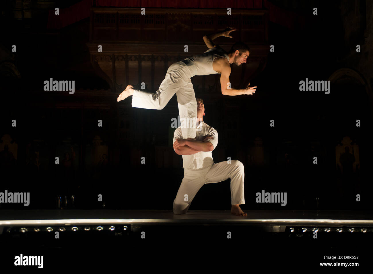 London, UK – 24 June 2013: Australian contemporary circus Circa and British vocal ensemble I Fagiolini presents their show “How Like and Angel” at St Bartholomew the Great church in East London as part of the Beyond Barbican summer programme. Acrobatic set-ups are performed by Gerramy Marsden and Paul O’ Keefe. Credit:  Piero Cruciatti/Alamy Live News Stock Photo