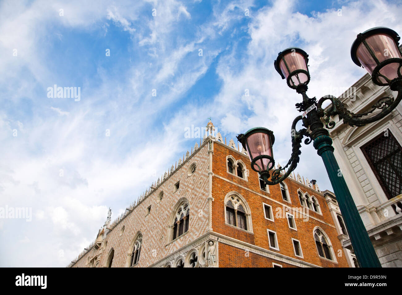 Low angle view of a lamppost outside a building, Doge's Palace, St. Mark's Square, Venice, Veneto, Italy Stock Photo
