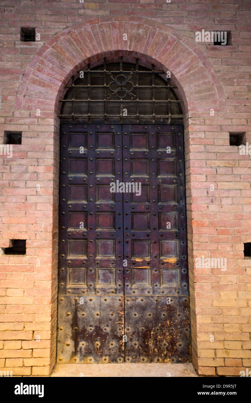 Closed door of a building, Siena, Siena Province, Tuscany, Italy Stock Photo