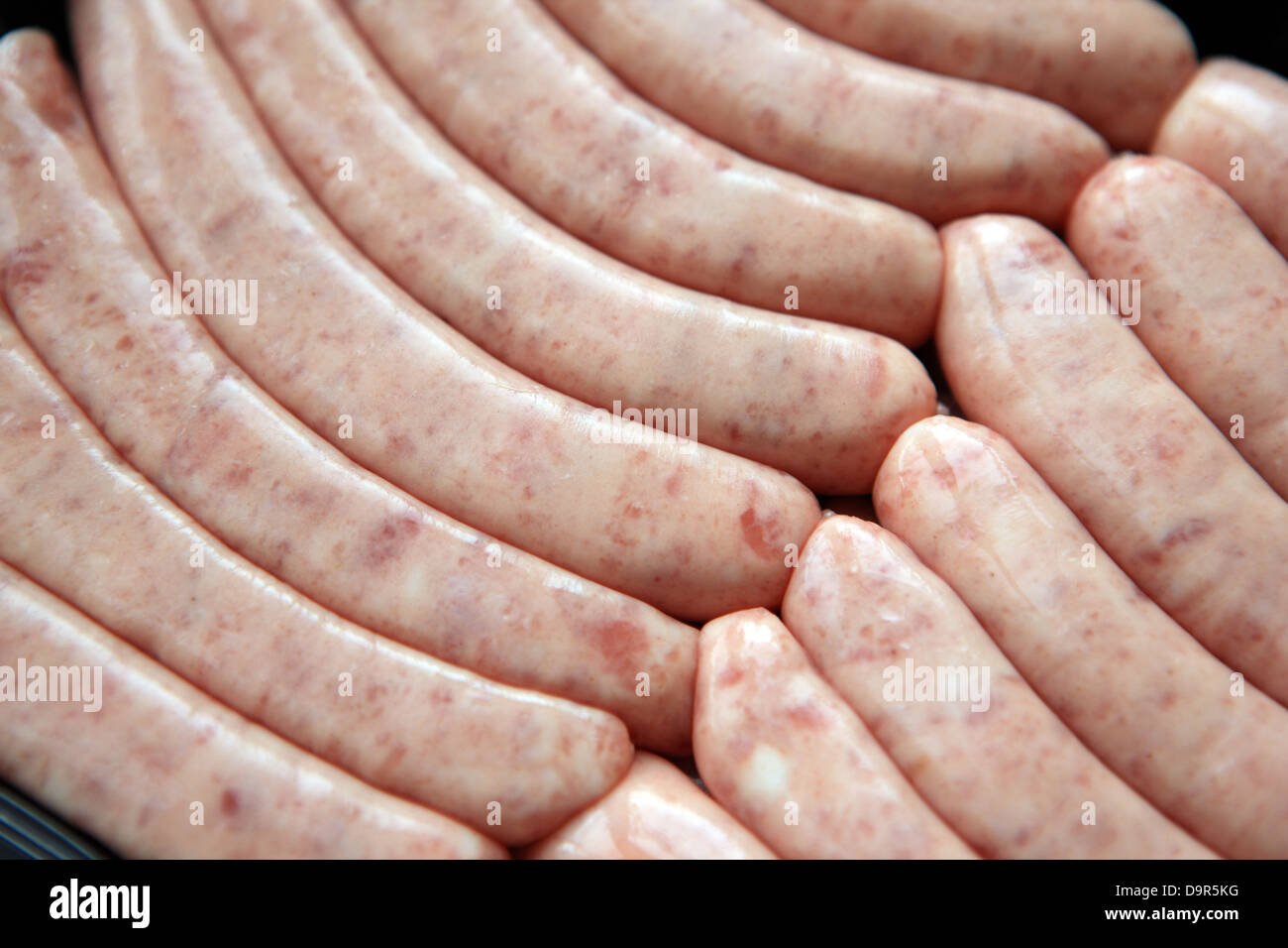 Pork sausages linked together Stock Photo