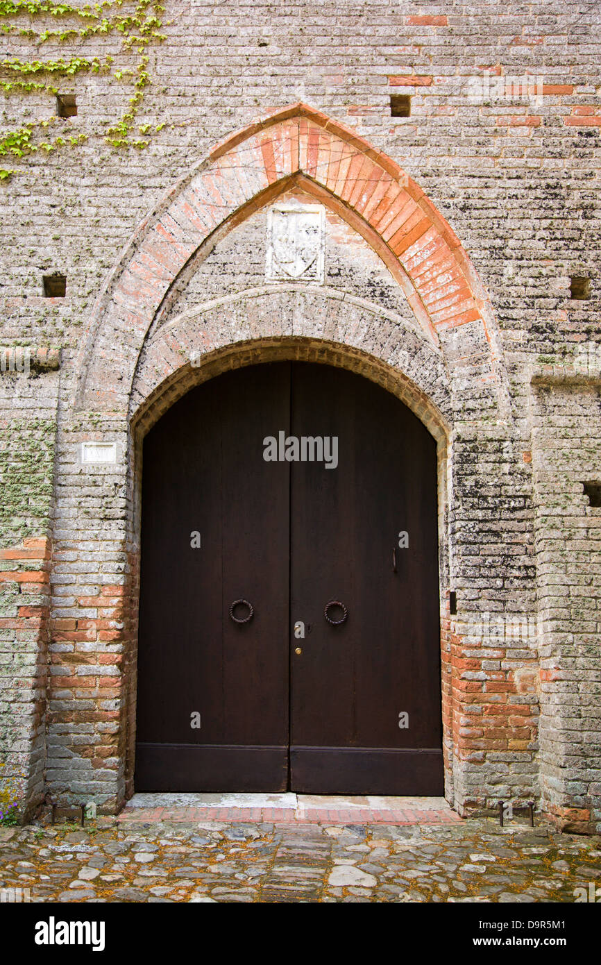 Closed door of a building, Siena, Siena Province, Tuscany, Italy Stock Photo