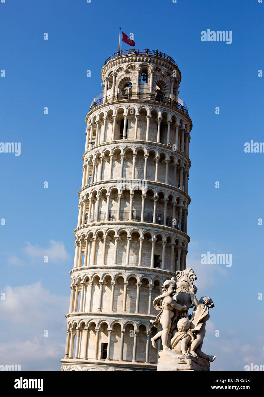Statue in front of a tower, La Fontana dei Putti Statue, Leaning Tower of Pisa, Piazza dei Miracoli, Pisa, Tuscany, Italy Stock Photo