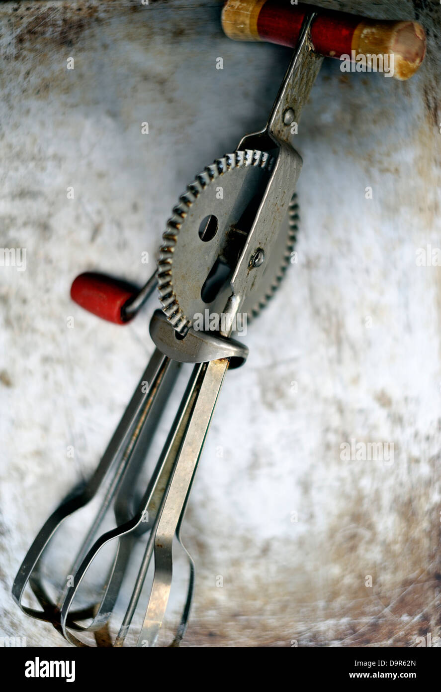 Vintage metal hand whisk with wooden handle Stock Photo Alamy