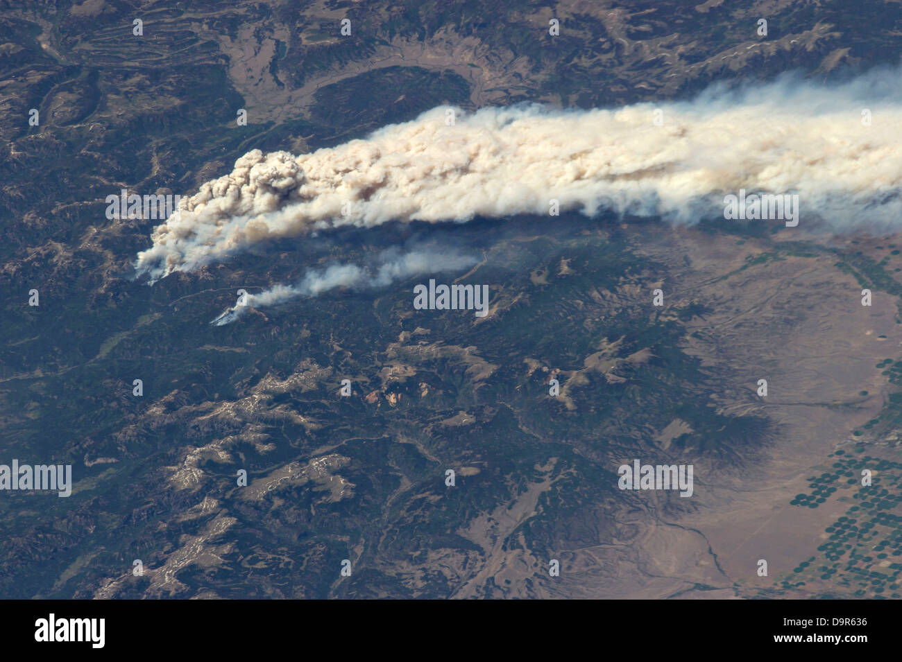 Aerial view from the International Space Station of the West Fork Complex fire June 19, 2013 in southern Colorado. The fire, a combination of three wildfires has burned about 75,150 acres of forest. Stock Photo