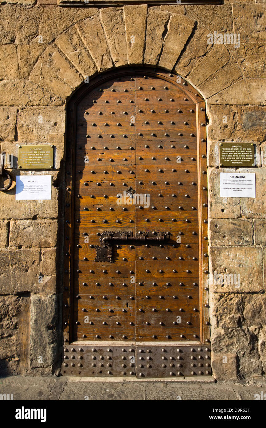 Closed doorway of a building, Florence, Tuscany, Italy Stock Photo