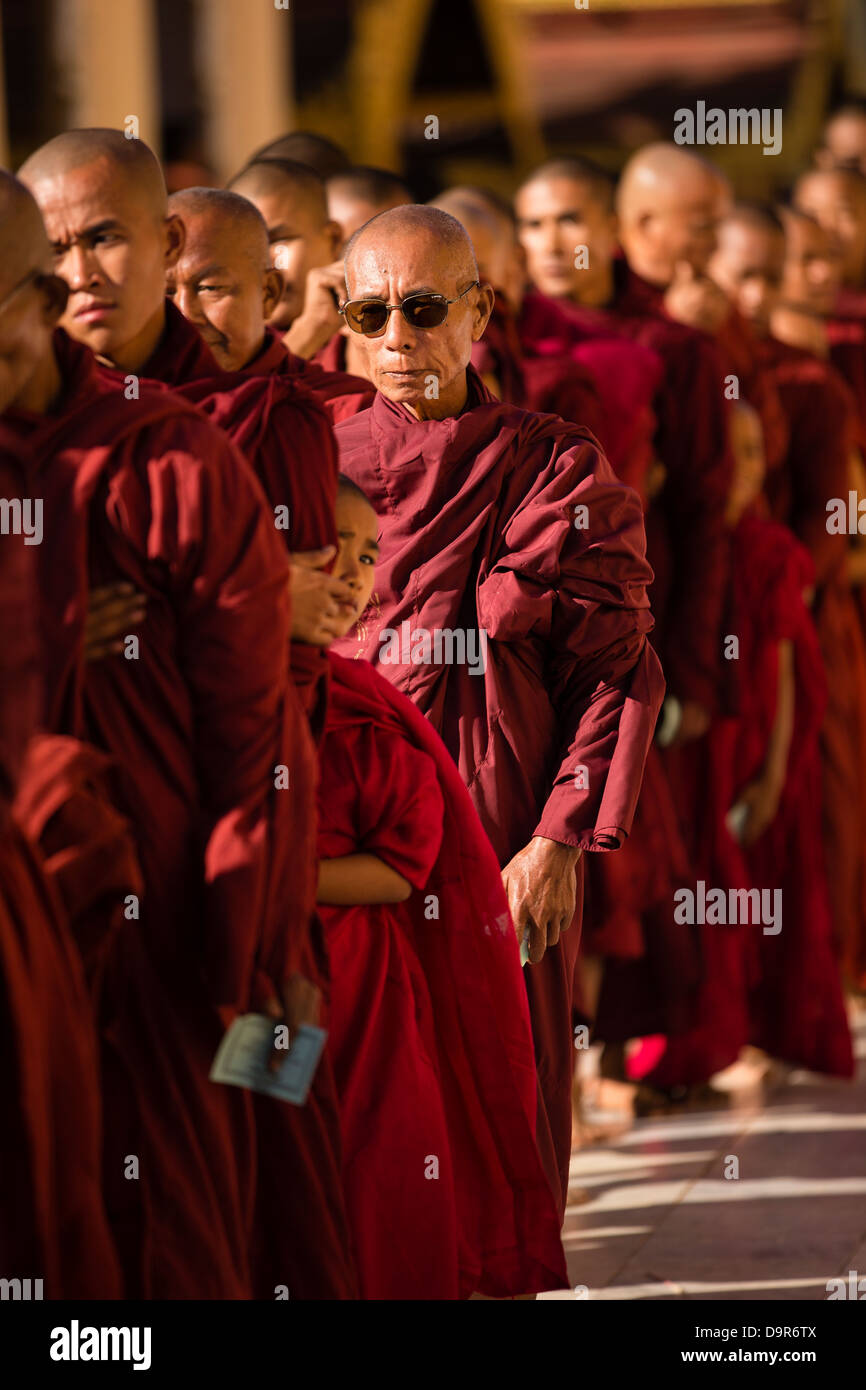 monks at the Shwezigon Paya, Bagan, Myanmar (Burma) Stock Photo