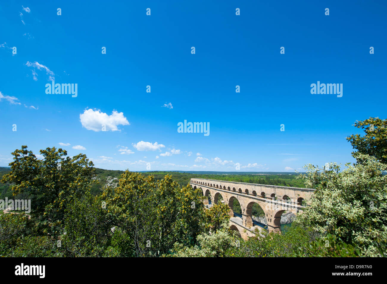 UNESCO world heritage site Pont du Gard, a Roman aqueduct passing the Gard river in the Gard near Nîmes, southern France Stock Photo