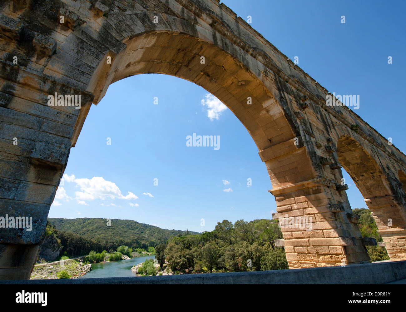 Arc of UNESCO World Heritage Pont-du-Gard, a Roman aqueduct spanning the Gard river near Nîmes in southern France Stock Photo