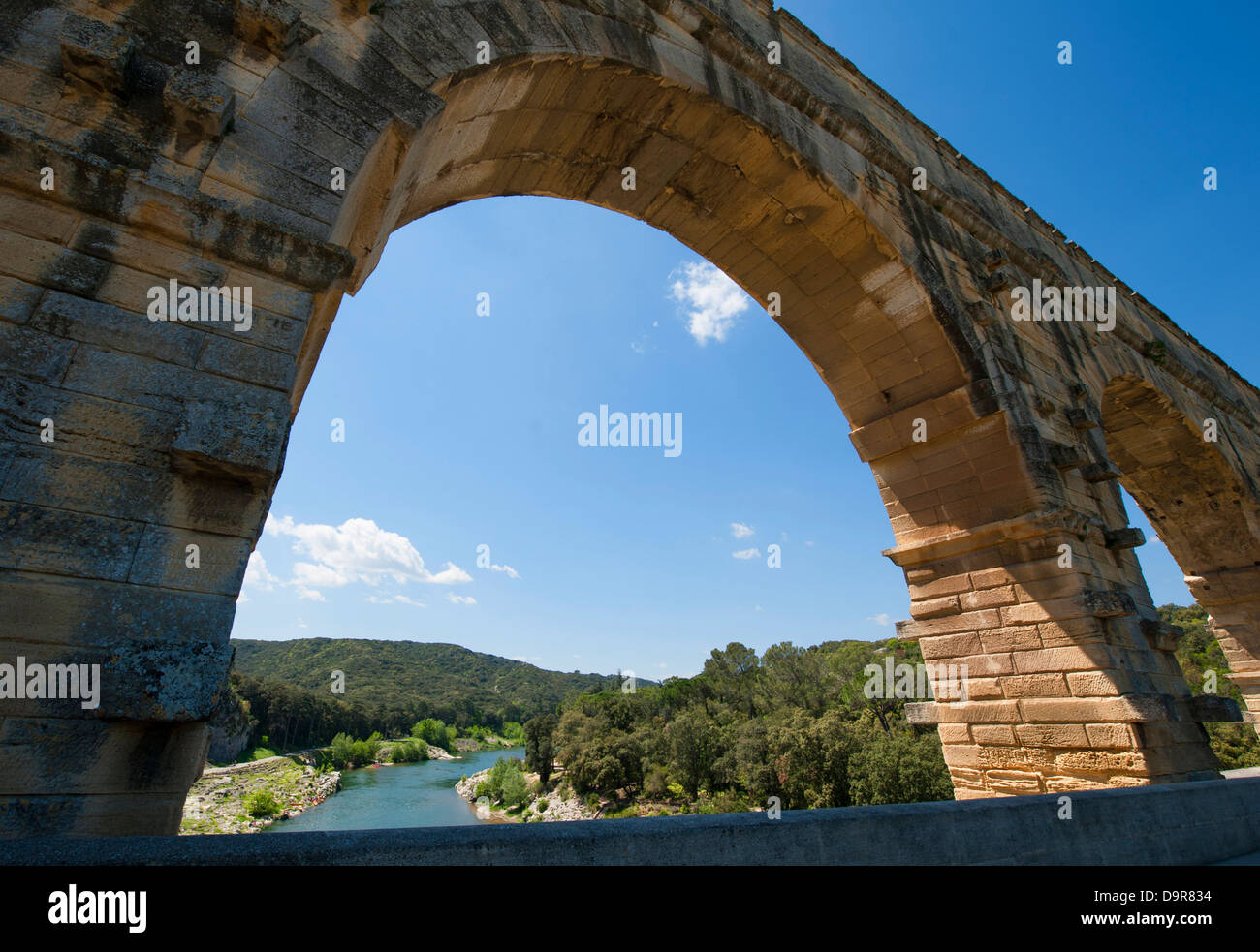 Arc of UNESCO World Heritage Pont-du-Gard, a Roman aqueduct spanning the Gard river near Nîmes in southern France Stock Photo