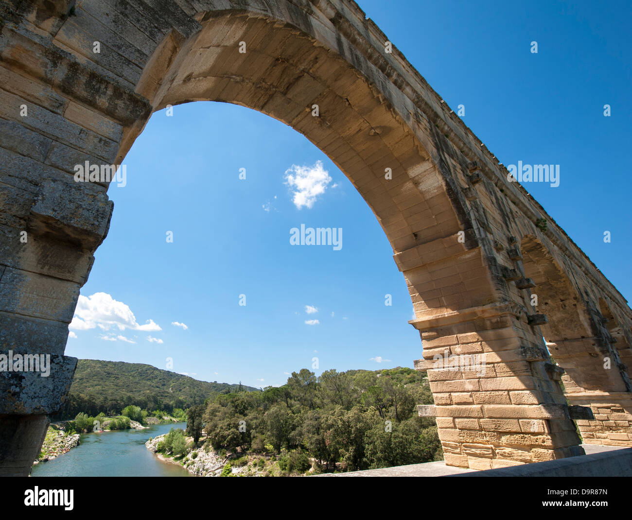 Arc of UNESCO World Heritage Pont-du-Gard, a Roman aqueduct spanning the Gard river near Nîmes in southern France Stock Photo