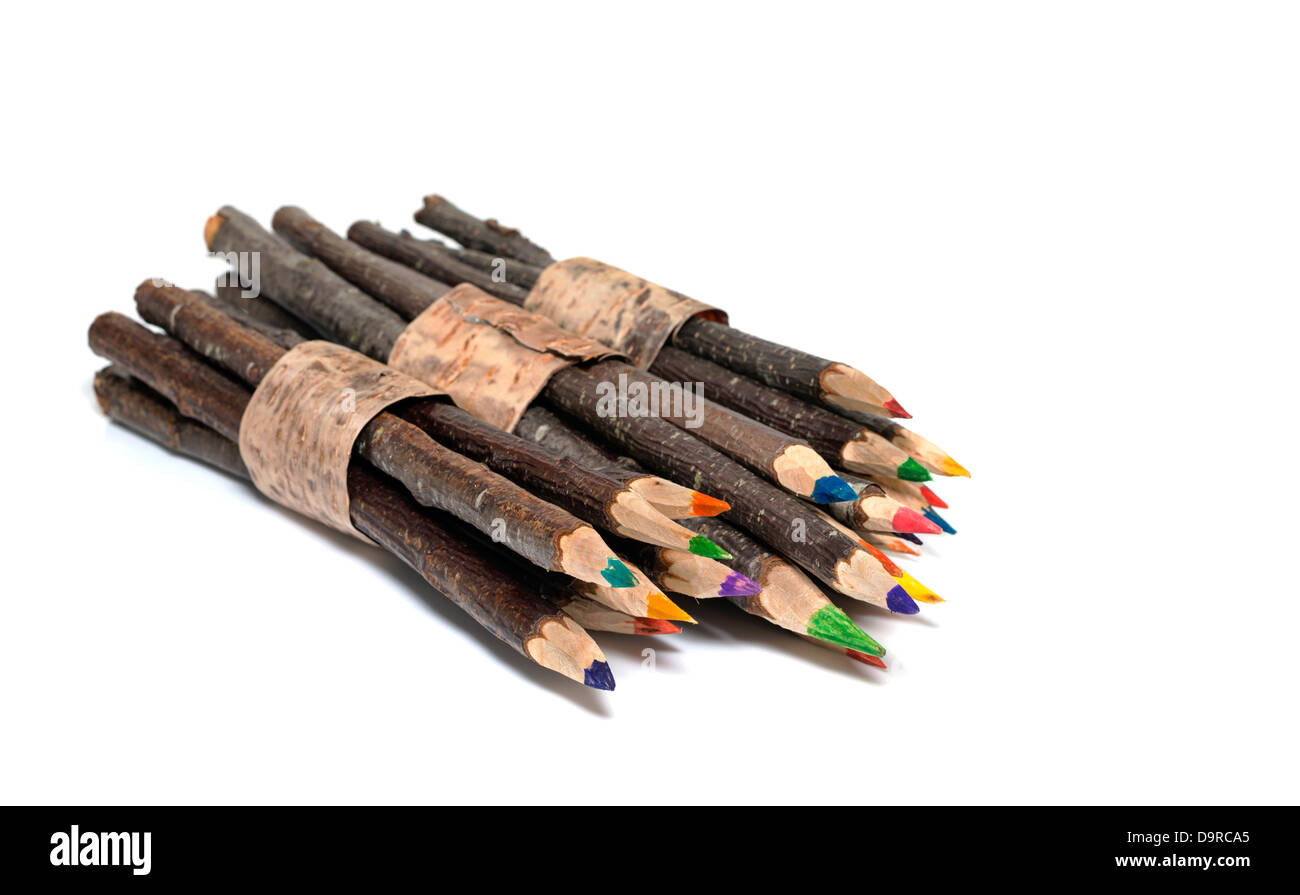 original wooden pencils in green orange and yellow Stock Photo