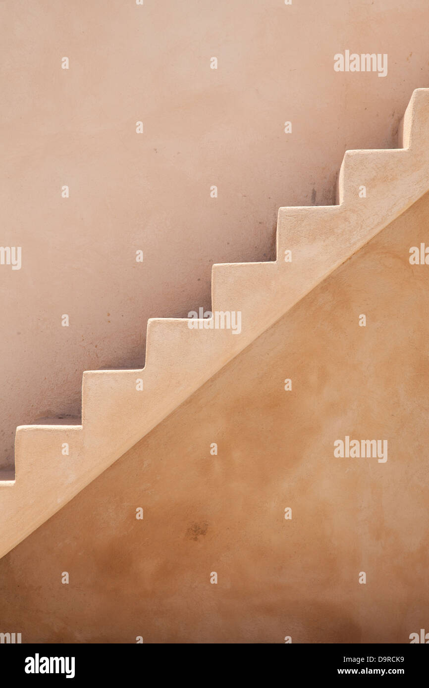 A concrete staircase beside a house in Megalochori, Santorini, Greece. Stock Photo