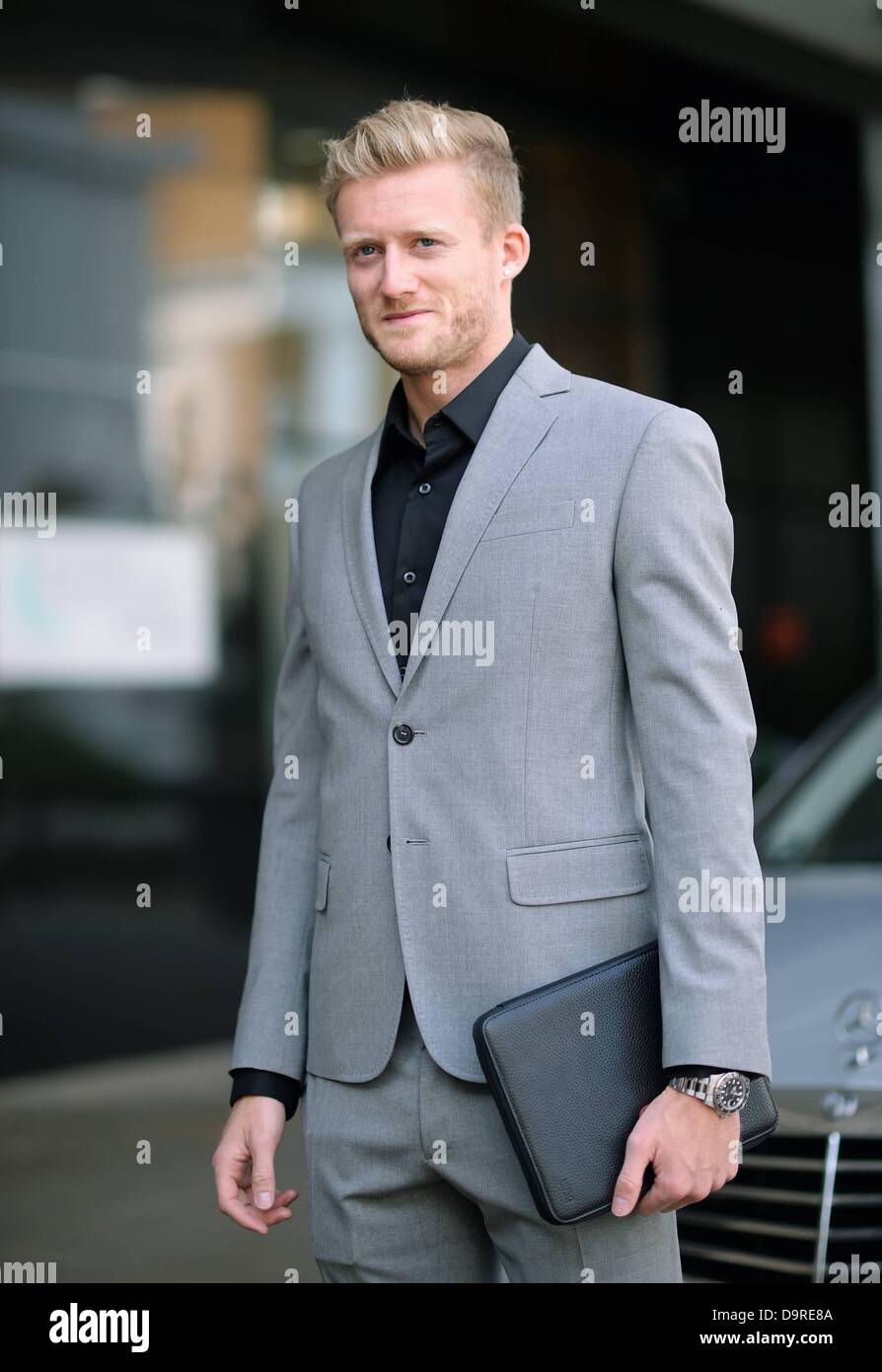 Chelsea, London, UK. 25th June 2013. German international footballer Andre Schurrle arrives at the grounds of Premier League club Chelsea in London to sign his new contract that transferred him from Bayern Leverkusen to Chelsea for 2013-14 season Credit:  Action Plus Sports Images/Alamy Live News Stock Photo