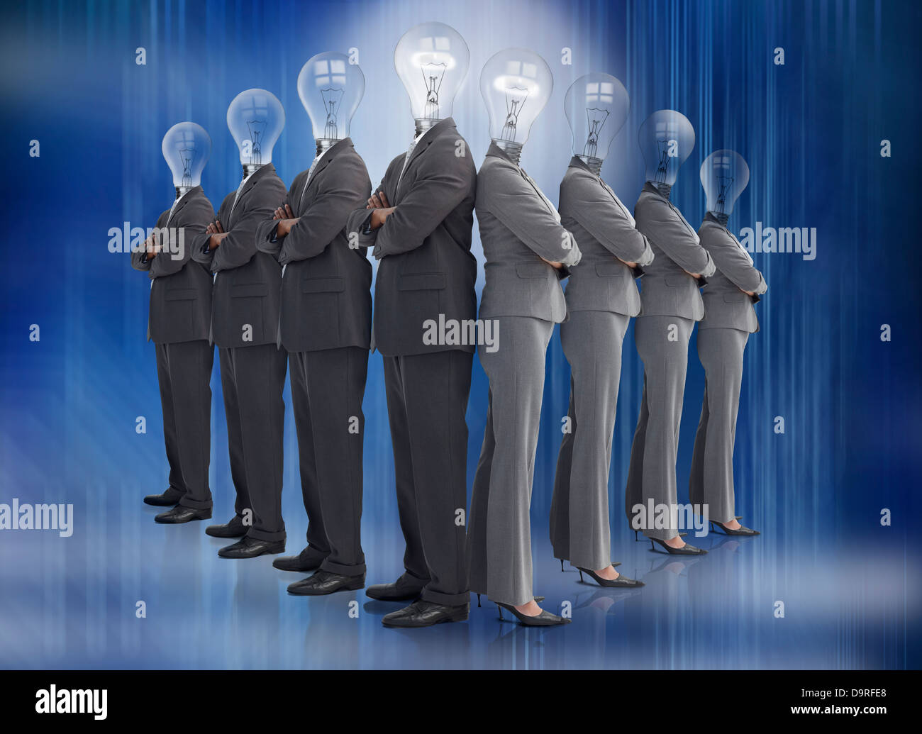 Business team with bulb heads in line Stock Photo