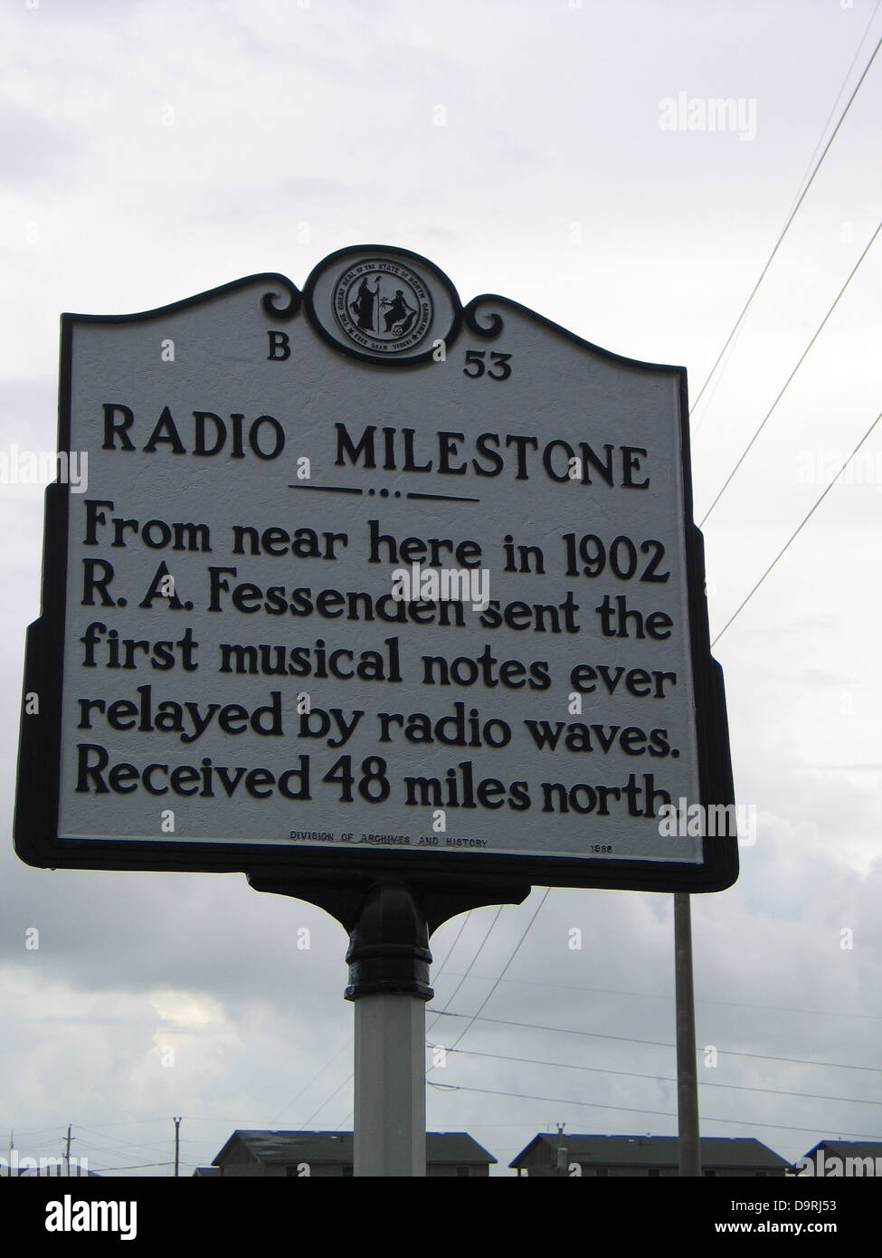 RADIO MILESTONE From near here in 1902 R. A. Fessenden sent the first musical notes ever relayed by radio waves. Received 48 miles north. Division of Archives and History, 1988 Stock Photo