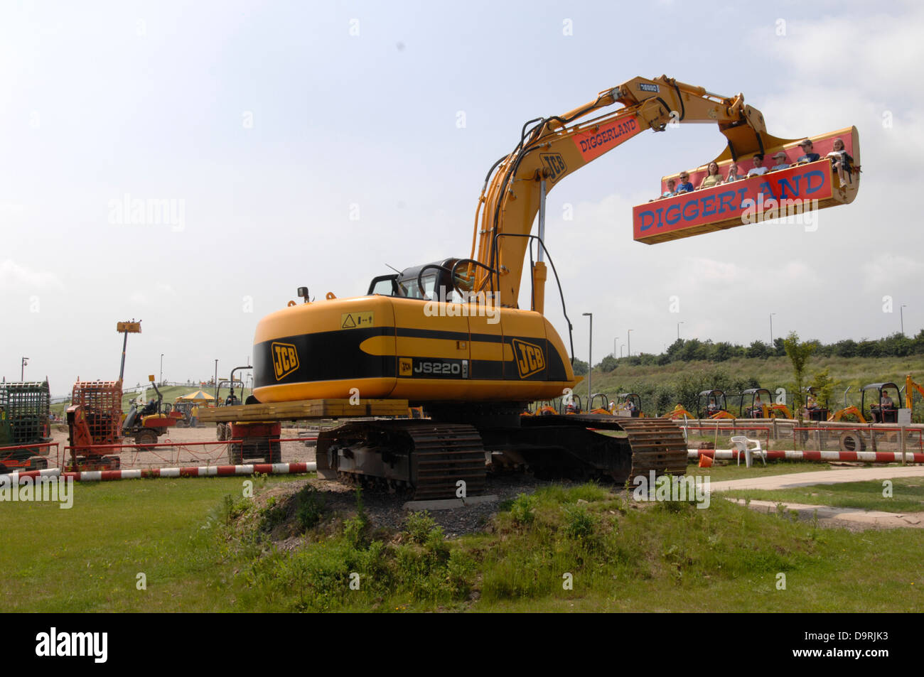 JCB racing and stunts in Diggerland Strood Kent Stock Photo