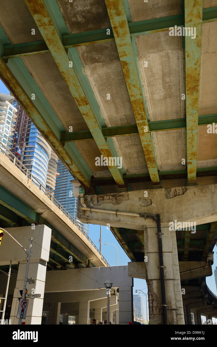 Crumbling concrete on elevated Gardiner Expressway in downtown Toronto infrastructure decline Stock Photo