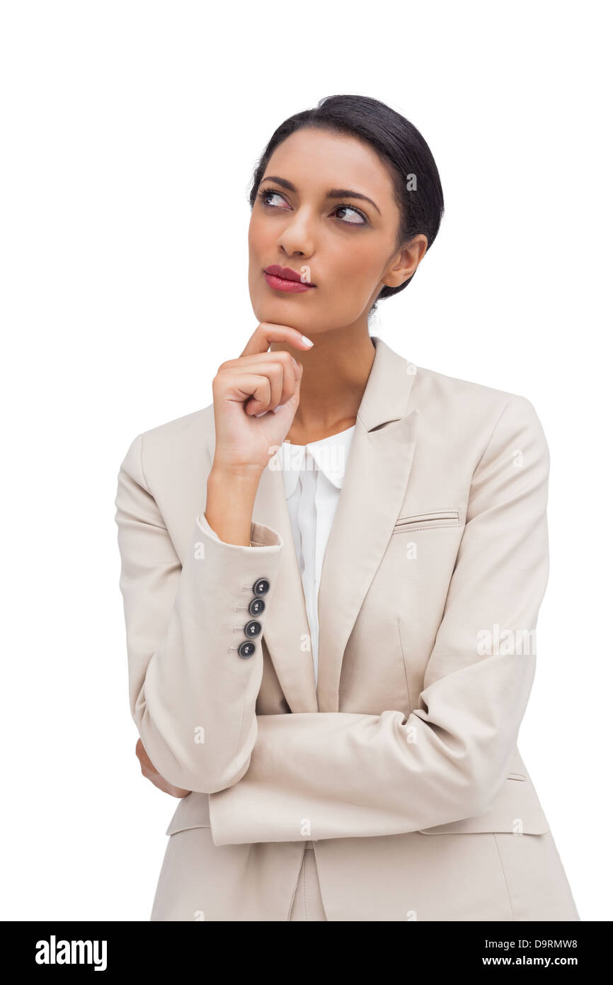 Thoughtful business woman standing Stock Photo Alamy
