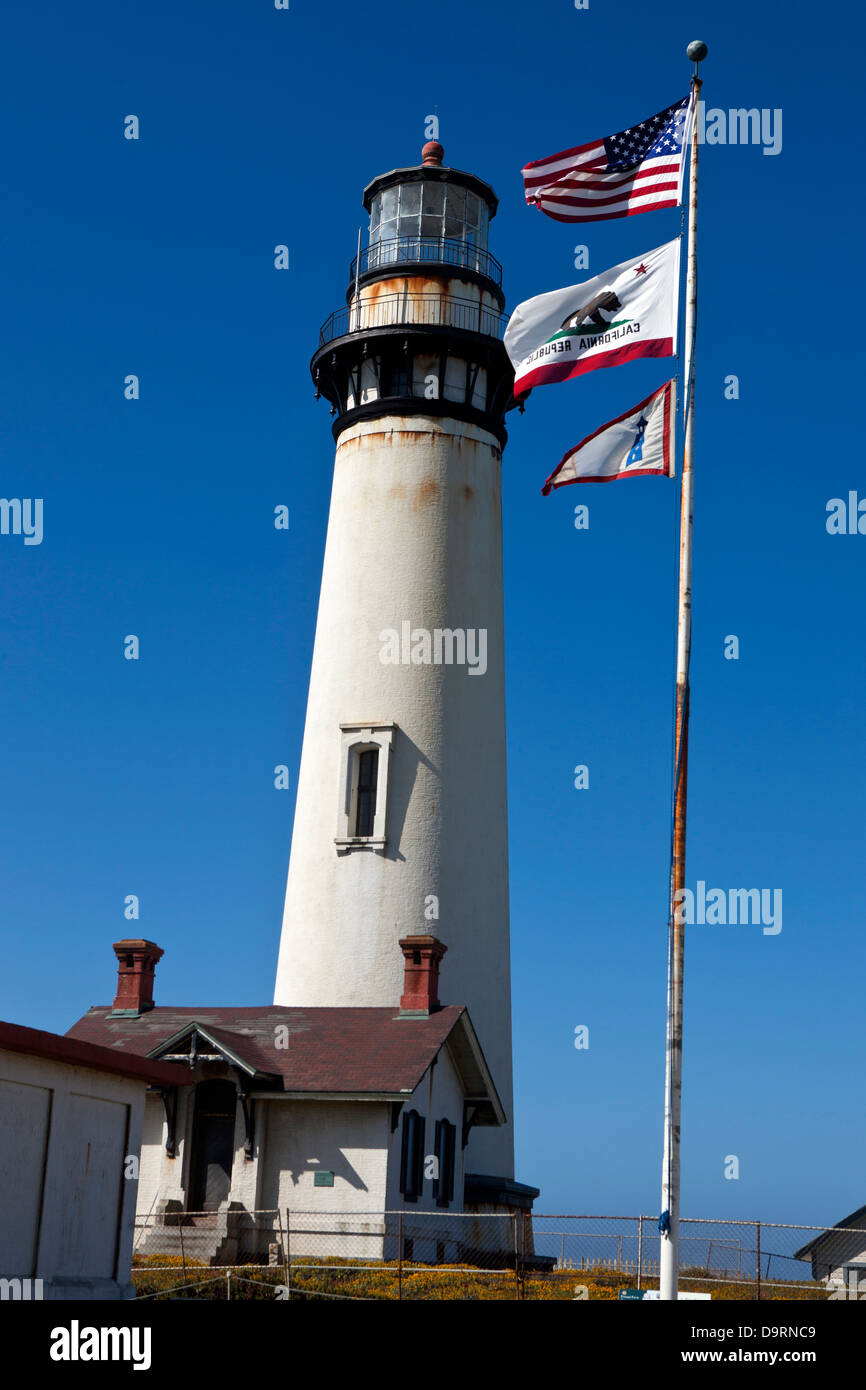 Pigeon Point Lighthouse with American and California flags, Pescadero, California, United States of America Stock Photo