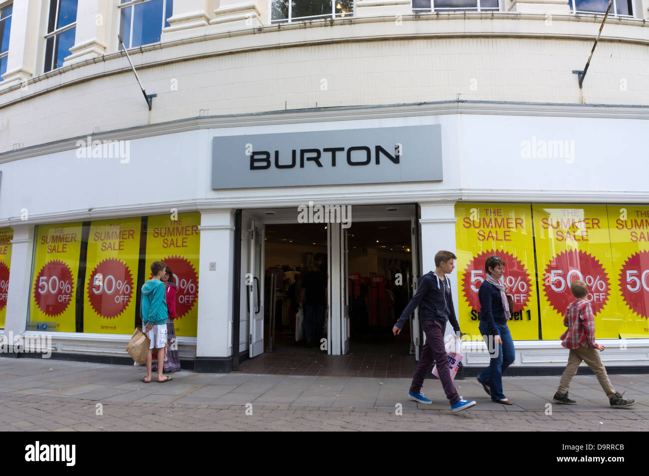 A branch of Burton Menswear shops in King's Lynn High Street, Norfolk. Stock Photo