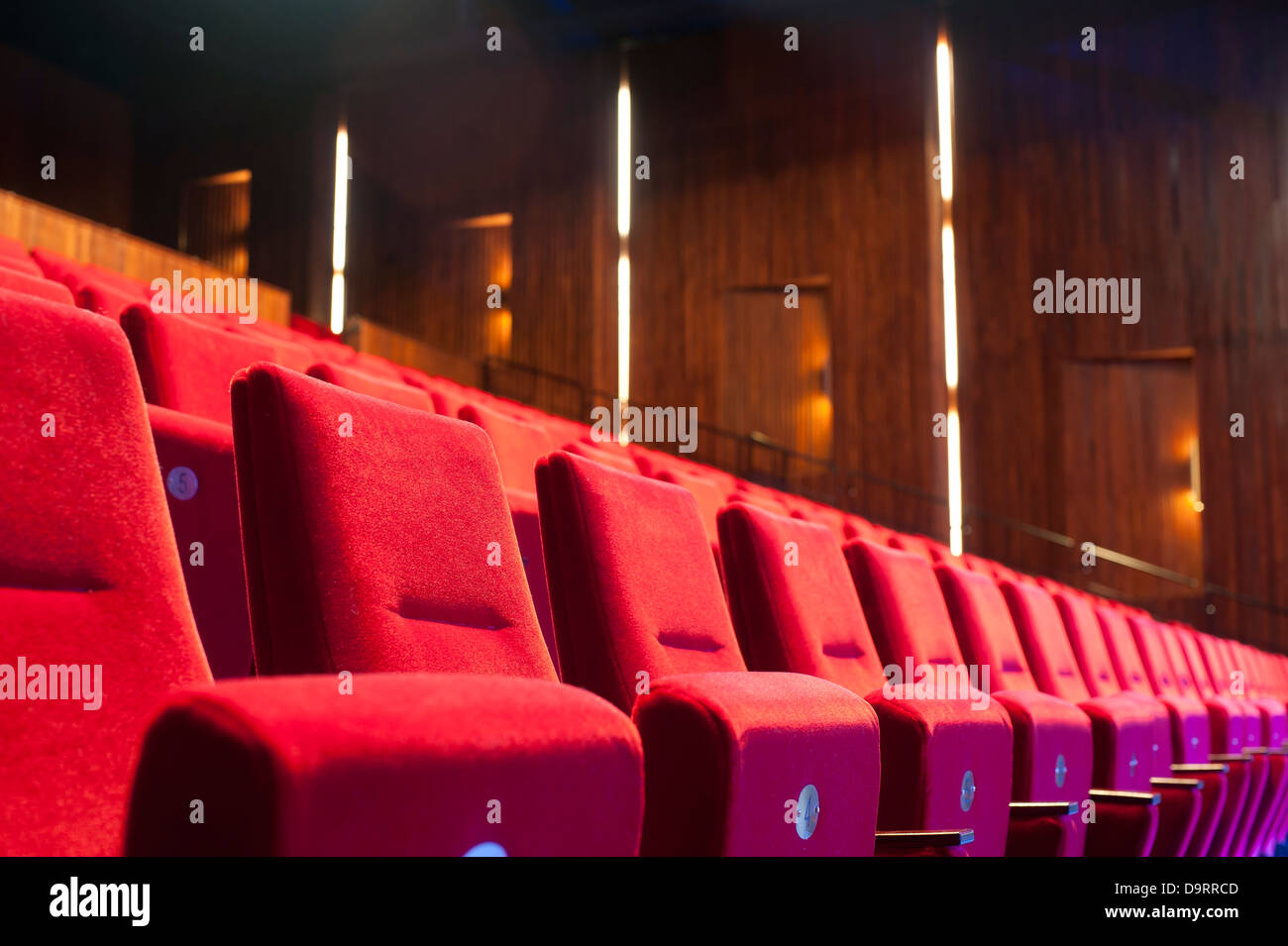 a row of seats in a theater Stock Photo Alamy