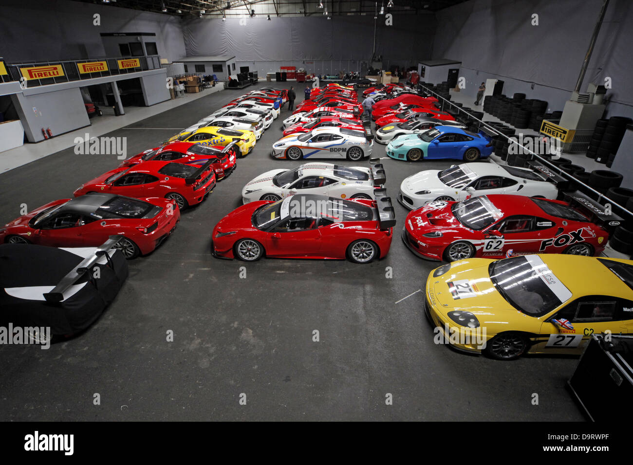 RACING FERRARI'S CARS IN GARAGE FF CORSE SILVERSTONE ENGLAND 16 May 2013 Stock Photo