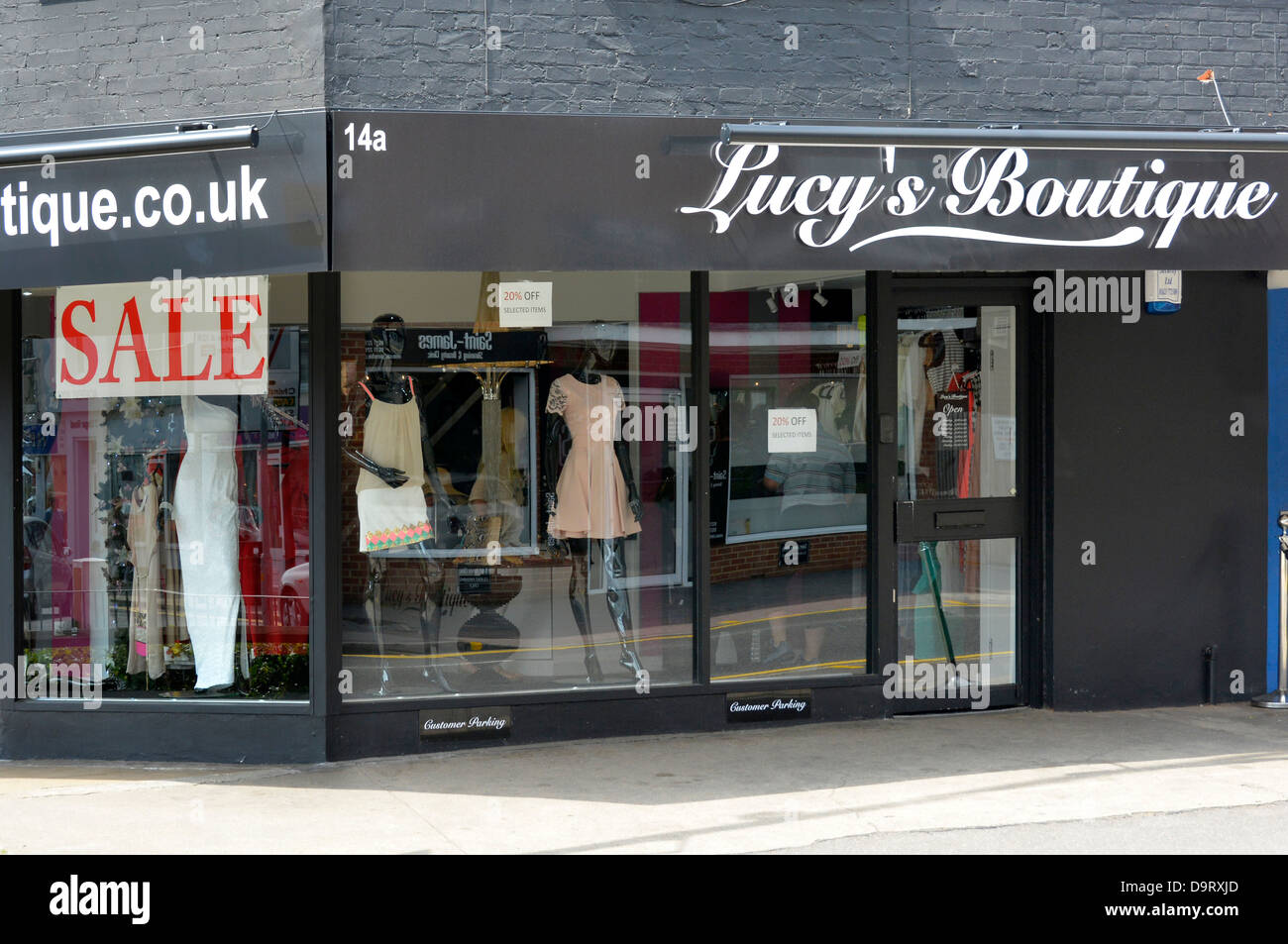 Lucys Boutique corner shop front and store windows owned by Lucy Mecklenburgh a one time cast member in the TOWIE The Only way Is Essex tv show UK Stock Photo