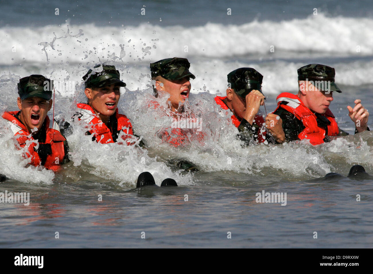 Navy SEAL candidates during surf passage exercises on the first phase of training at Naval Amphibious Base Coronado Sep. 10, 2009 in San Diego, CA. Stock Photo