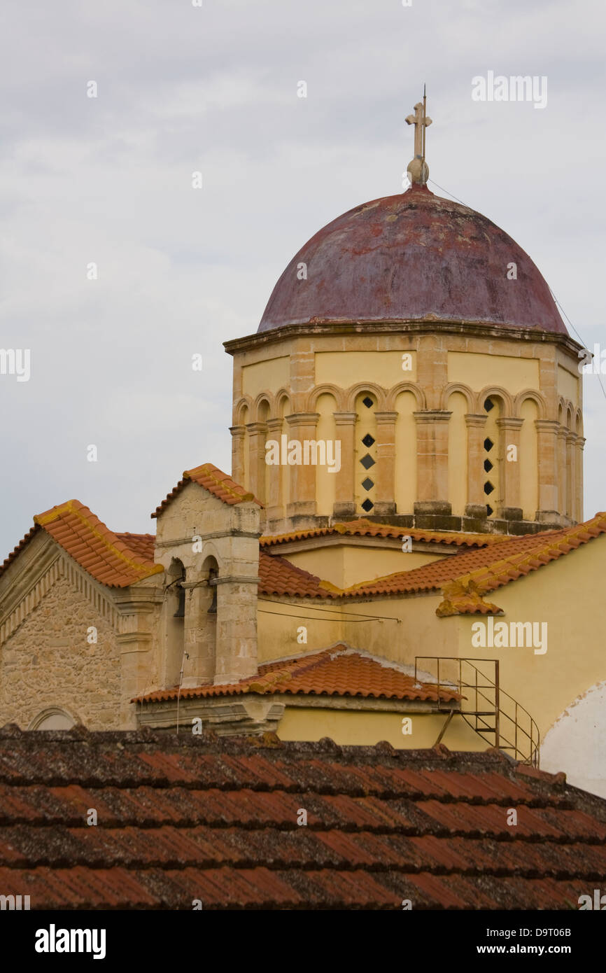 The 1886 Kataekeyaeoei Mepimnh (Greek orthodox church) dominates the tiny village of Gavalochori in Western Crete, Greece Stock Photo