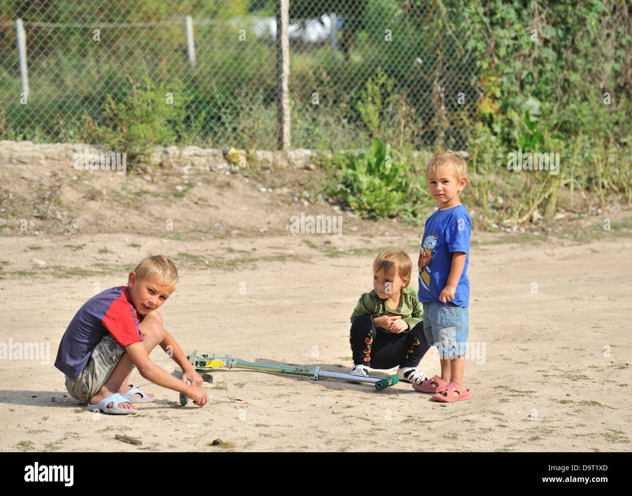 Children playing in a street, village of Branesti, Moldova Stock Photo -  Alamy