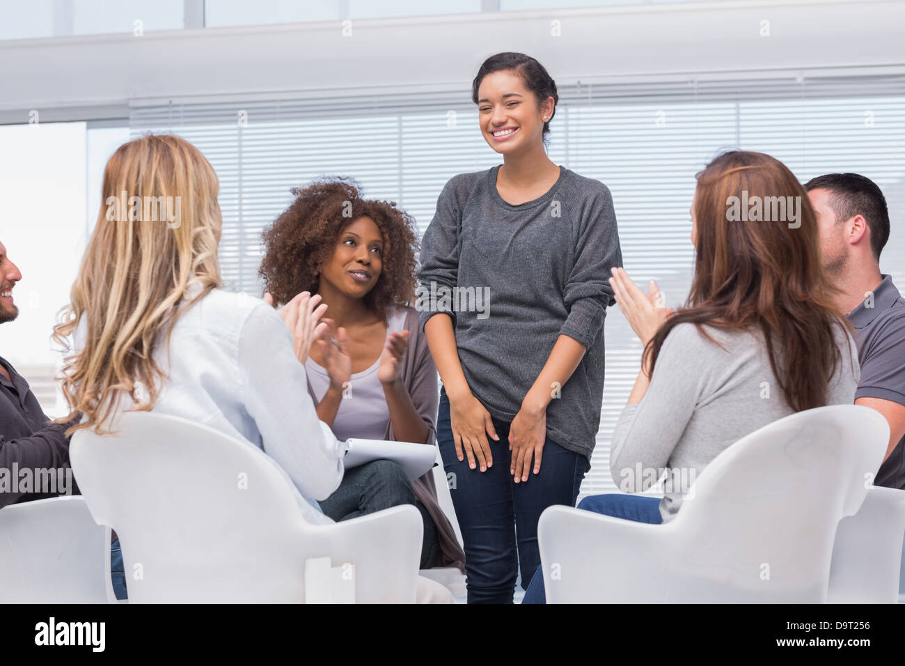 Patient has a breakthrough in group therapy Stock Photo