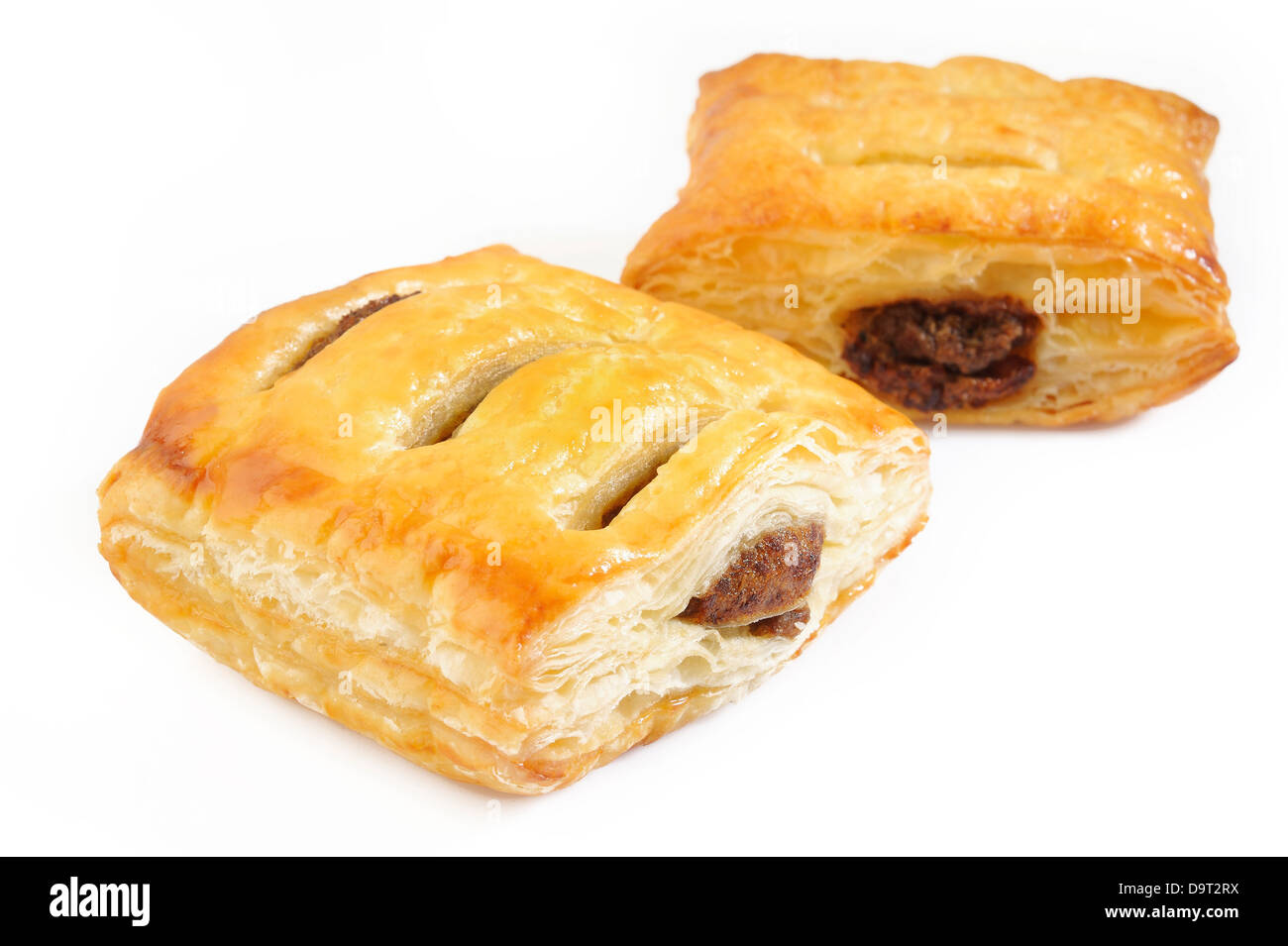 Puff pies with meat on white background Stock Photo - Alamy