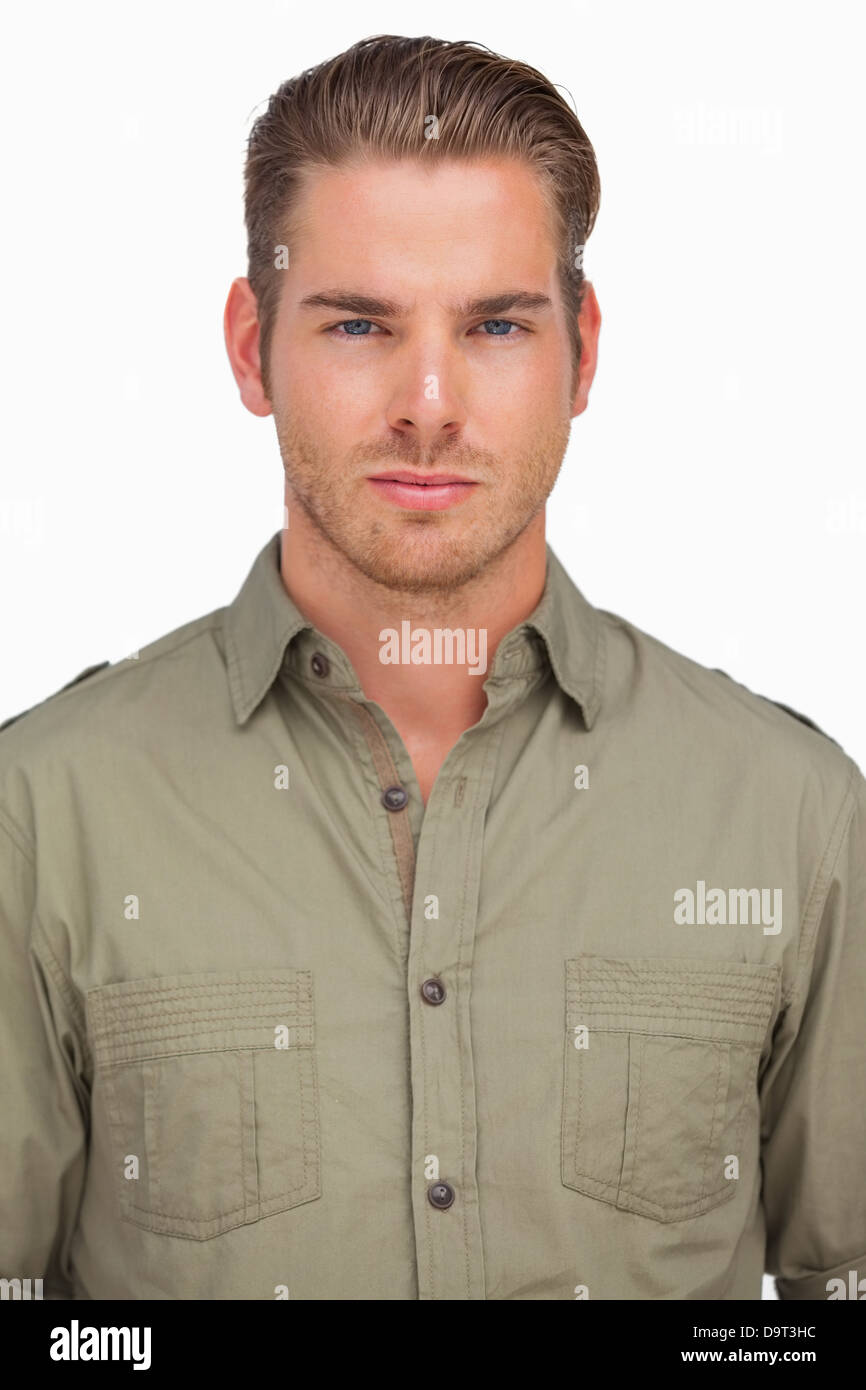 Handsome man smiling at camera Stock Photo - Alamy