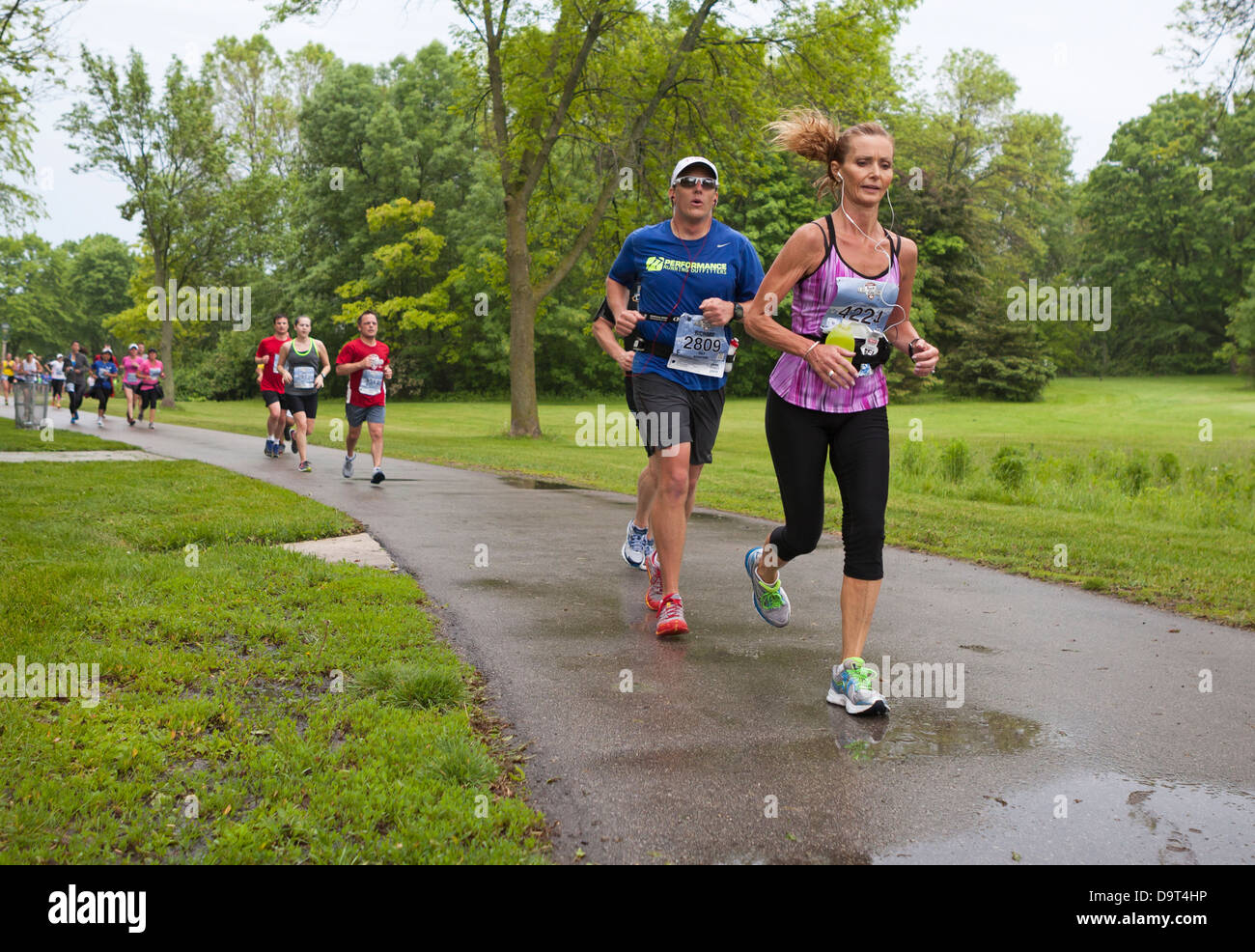 Runners participate in the Rock and Sole 1/2 Marathon in Milwaukee, Wisconsin. Stock Photo