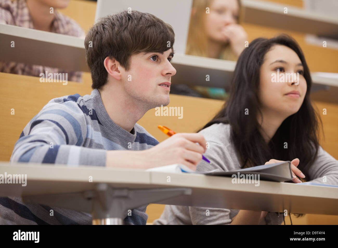 Paying attention in class hi-res stock photography and images - Alamy