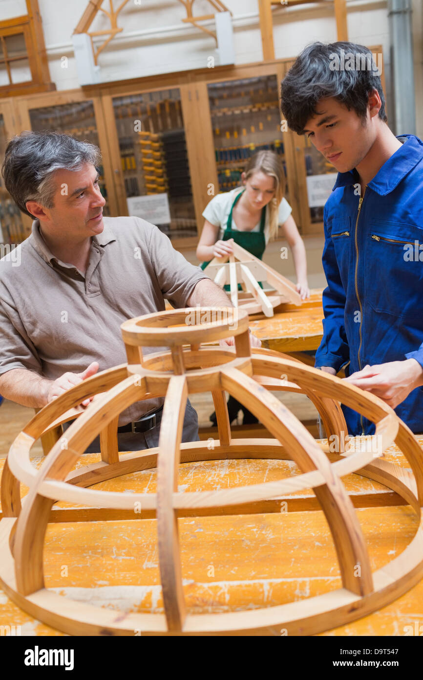 Male apprentice working carpenter in hi-res stock photography and ...