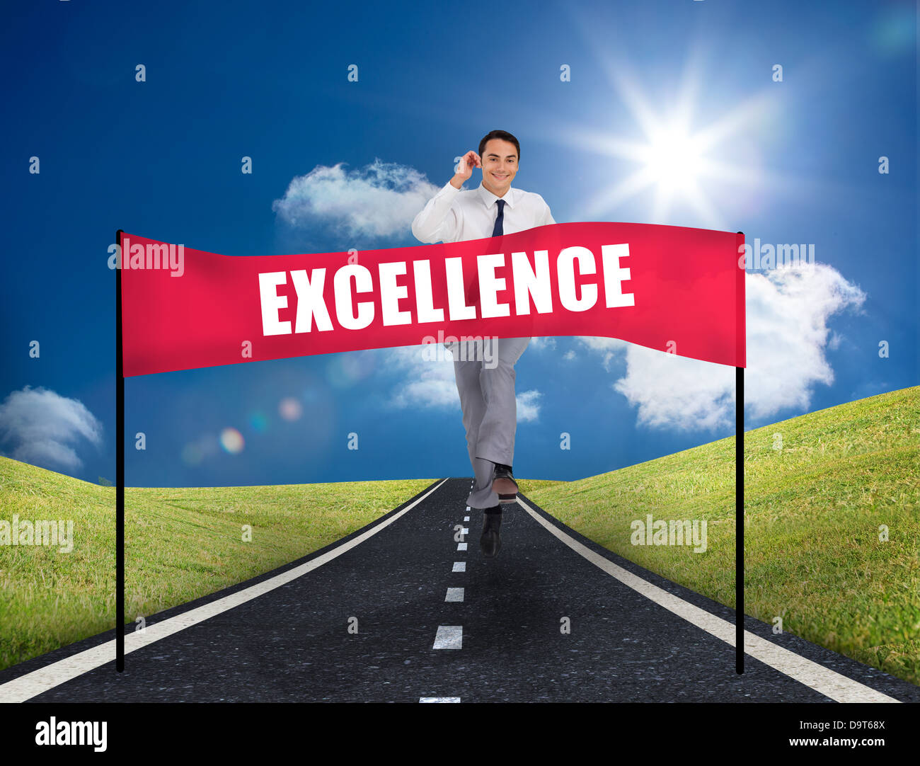 Businessman reaching a banner with excellence written on it Stock Photo