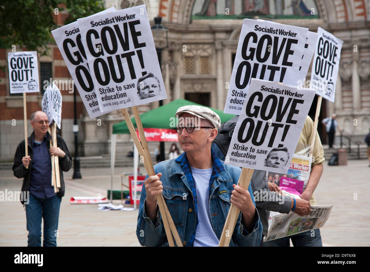 25 June 2013, London. Placards demand Gove's exit as teachers march in London against Education Secretary Michael Gove and his proposed reforms. Stock Photo