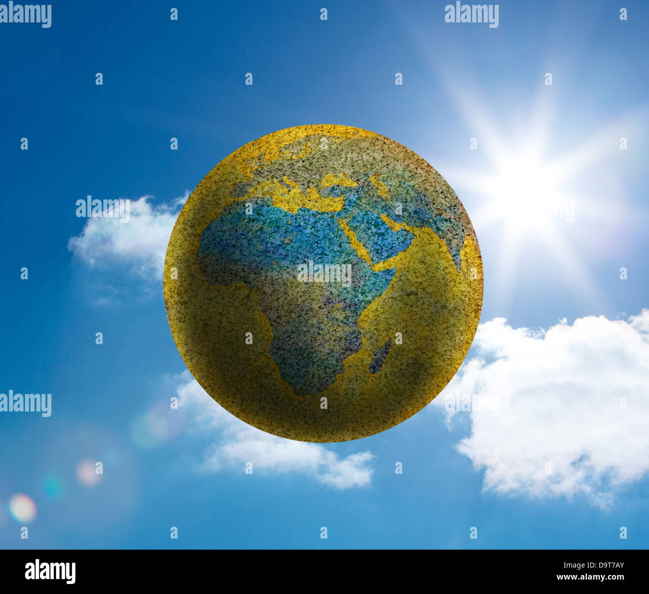 Globe floating in the sky Stock Photo